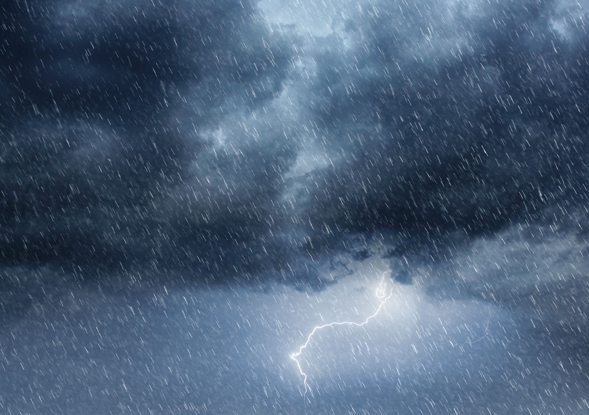 Dark Overcast Sky with Heavy Rain and Lightning - Intense Weather Phenomenon
